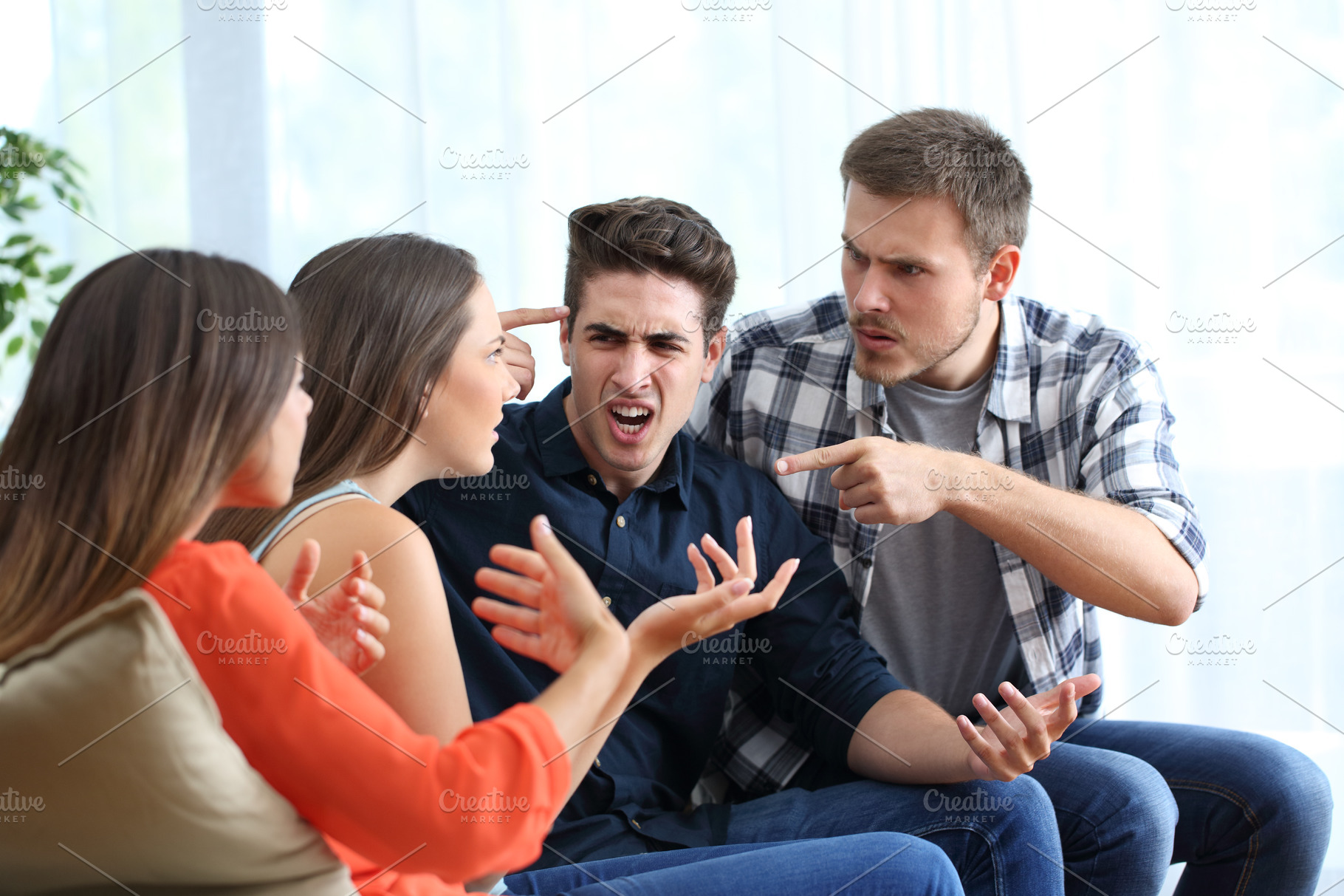 four-angry-friends-arguing-at-home-high-quality-people-images