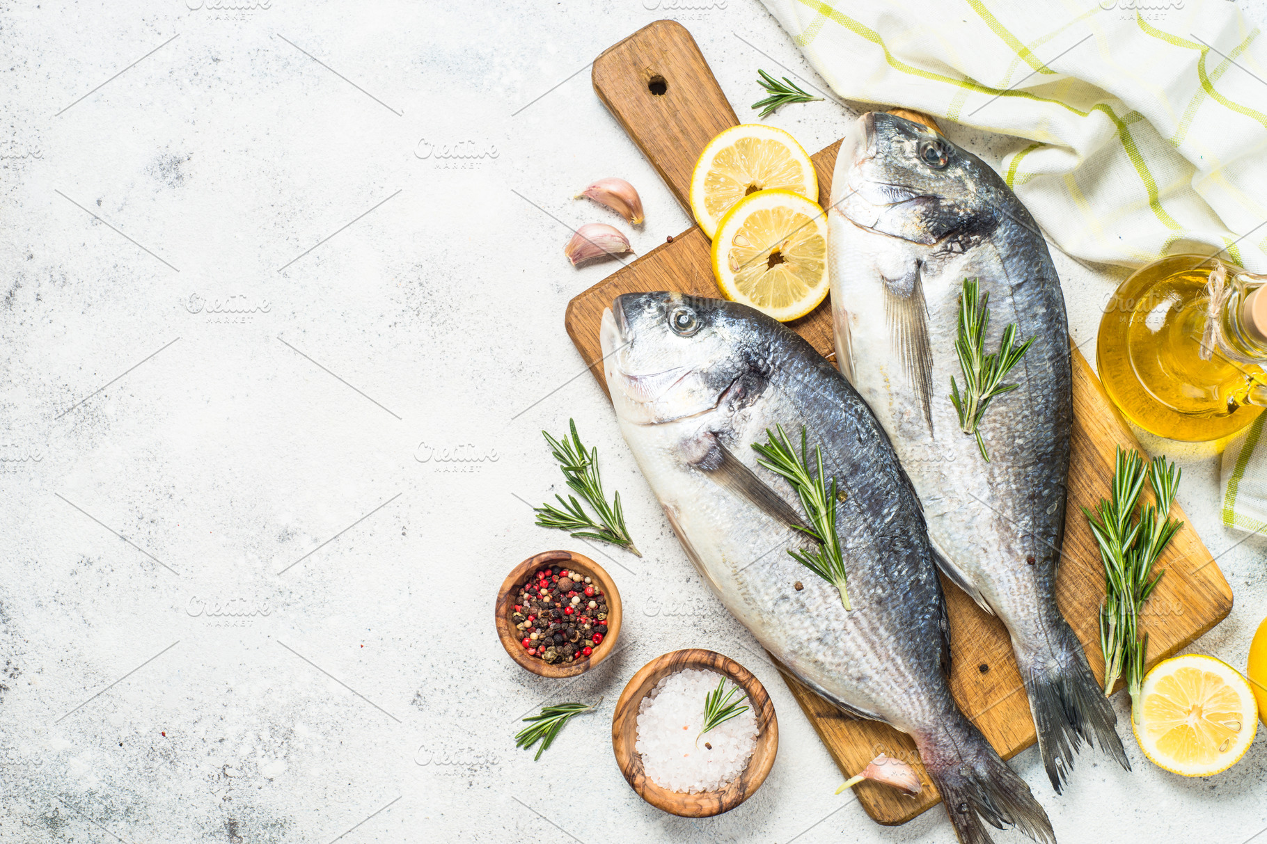 Dorado fish on cutting board.  Food Images ~ Creative Market