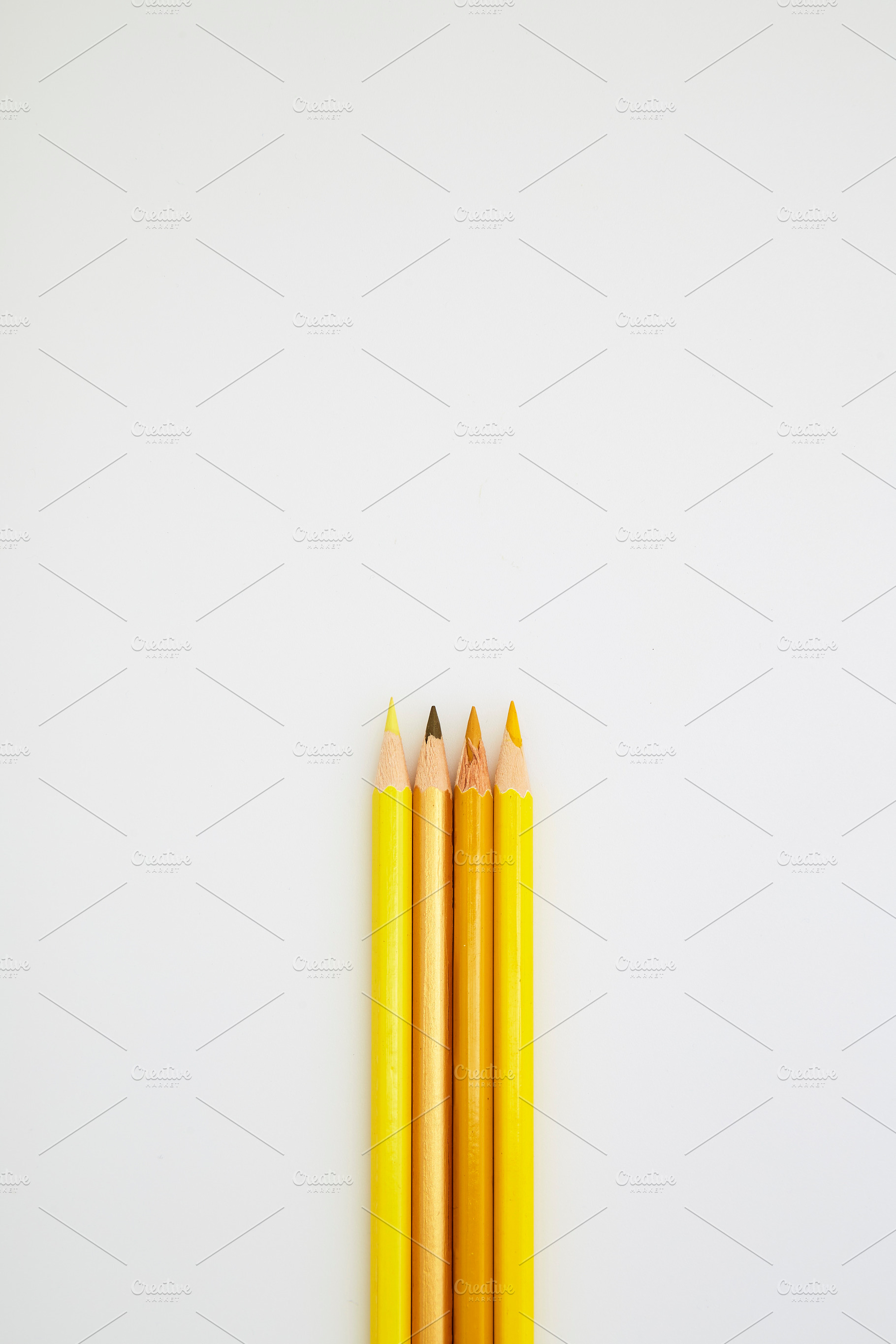 Yellow Color pencils isolated on whi | Background Stock Photos