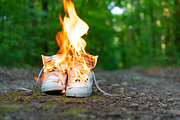 Used white high sneakers burning on featuring shoe, nobody, and sneaker ...