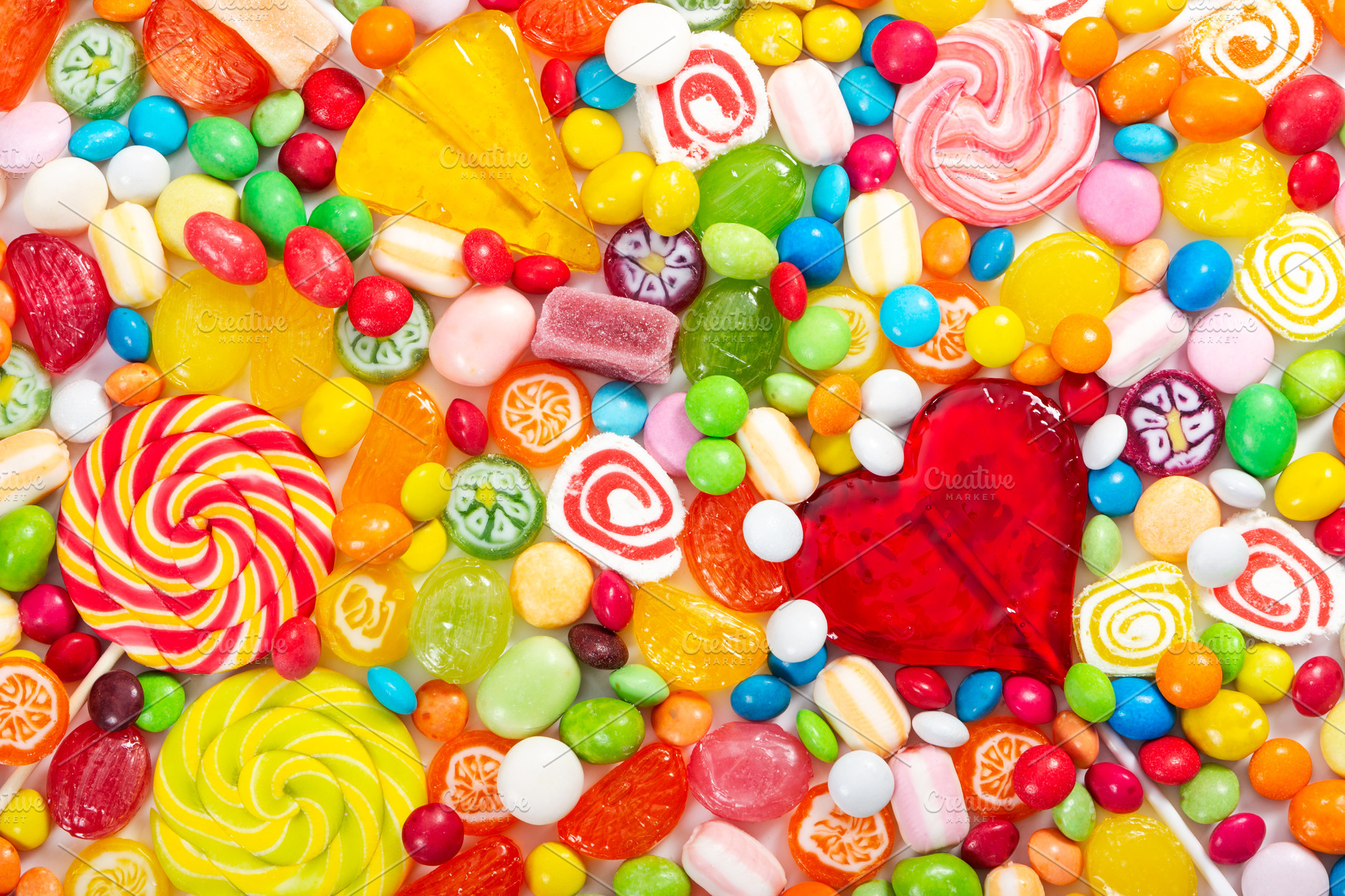 Colorful lollipops and candies containing candy, colorful, and ...