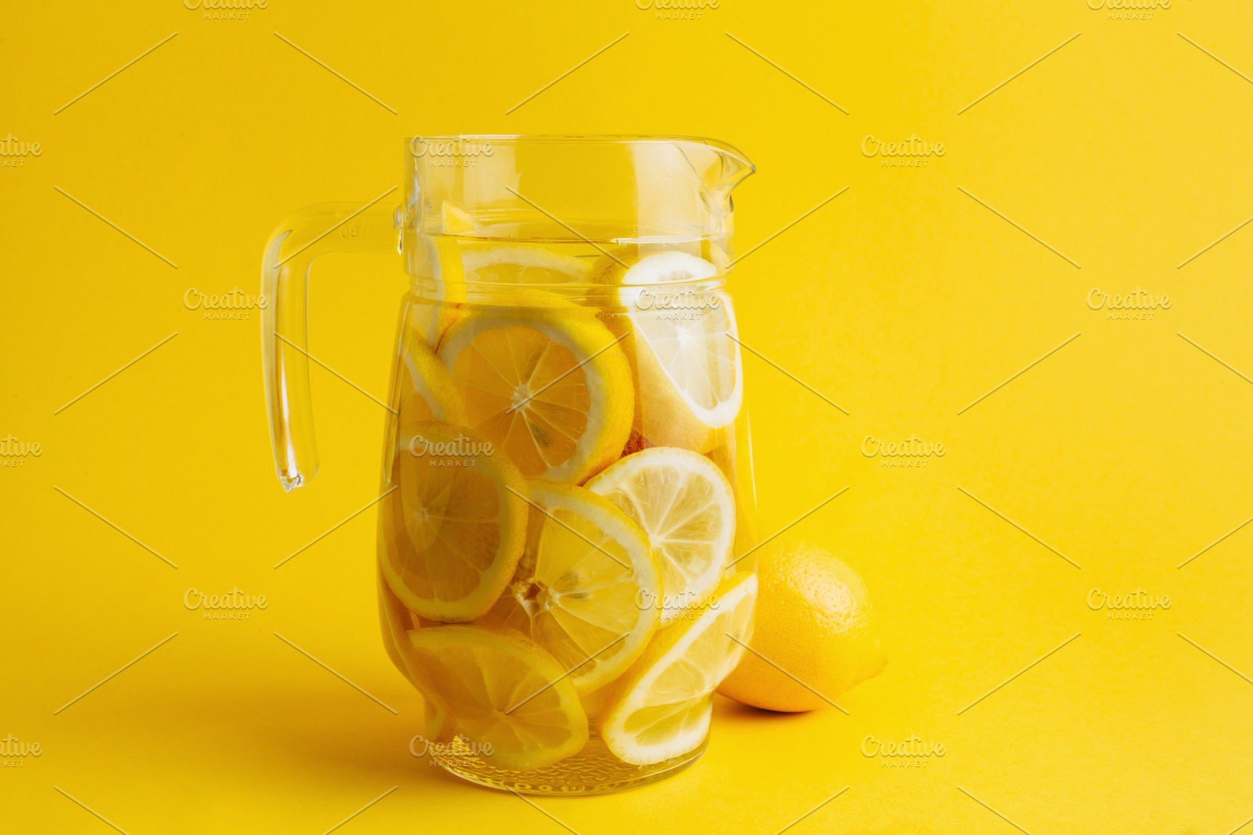 Download Lemonade Jar On A Yellow Background High Quality Food Images Creative Market PSD Mockup Templates