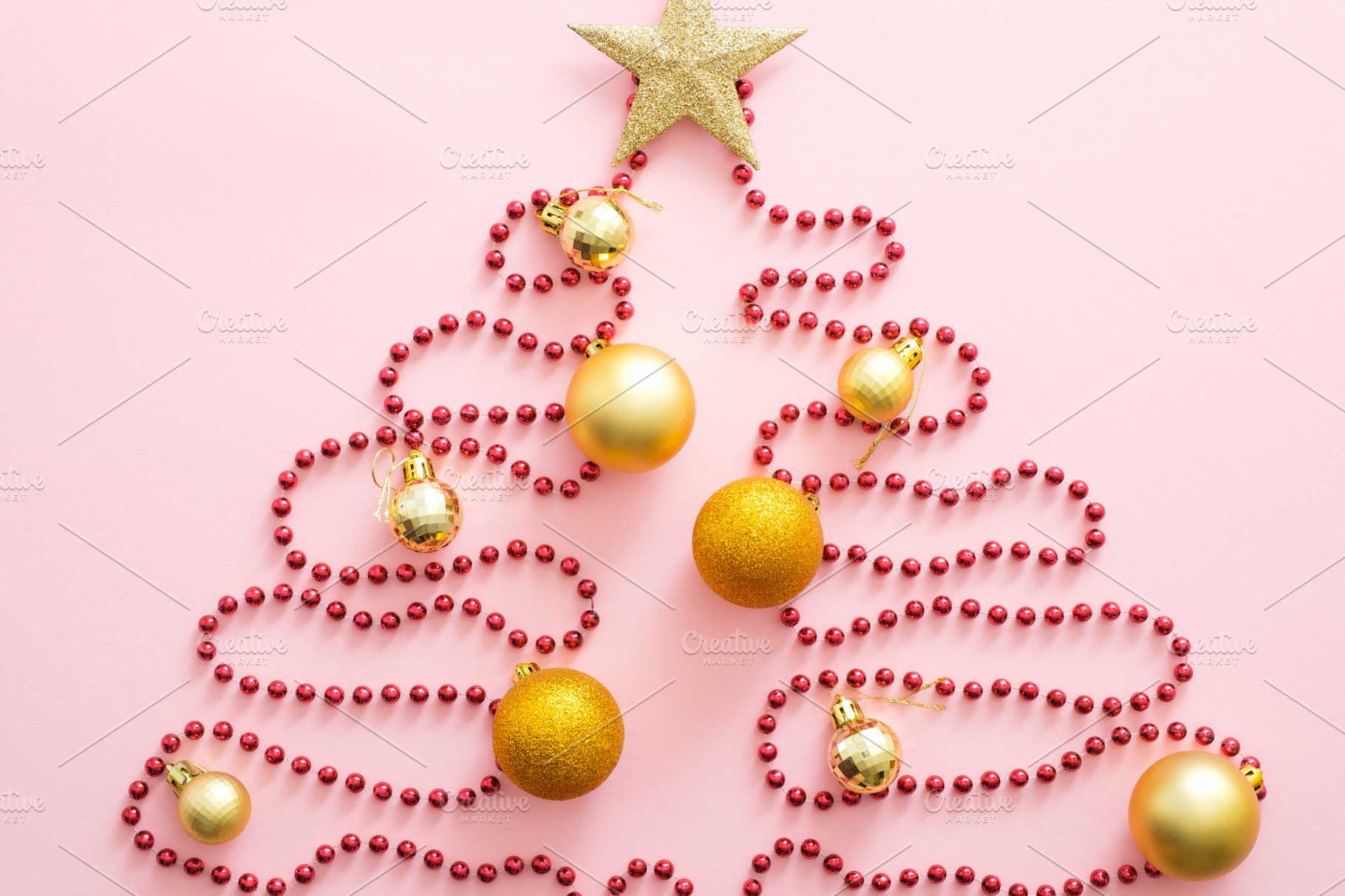 Christmas tree made of red garland, | Holiday Stock Photos ~ Creative ...