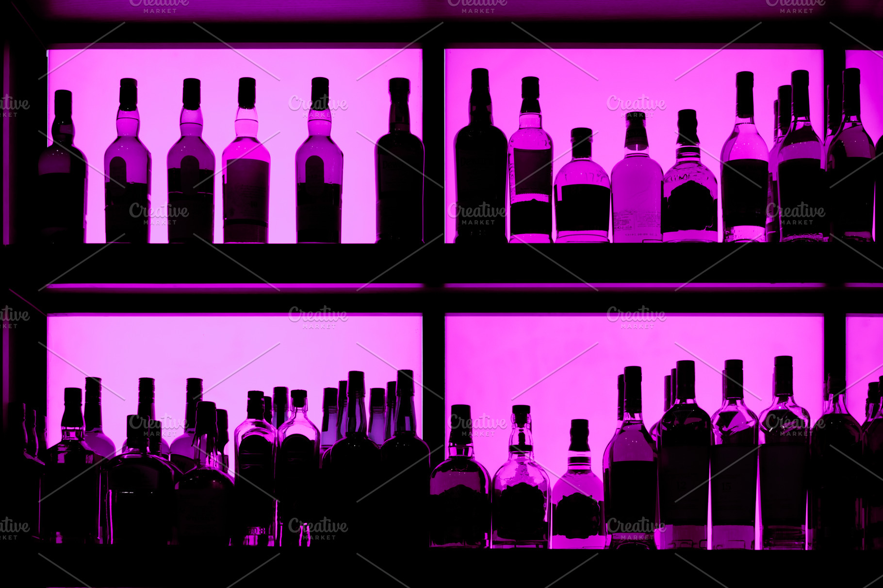 bottles-sitting-on-shelf-in-a-bar-containing-bar-shelf-and-counter