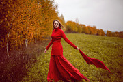 Girl in a red dress and sweater stan stock photo containing red and ...