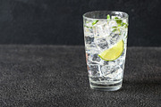 Glass of sparkling water stock photo containing background and beverage