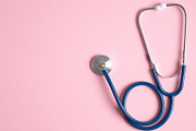 Stethoscope on pink background with containing stethoscope, cardiology