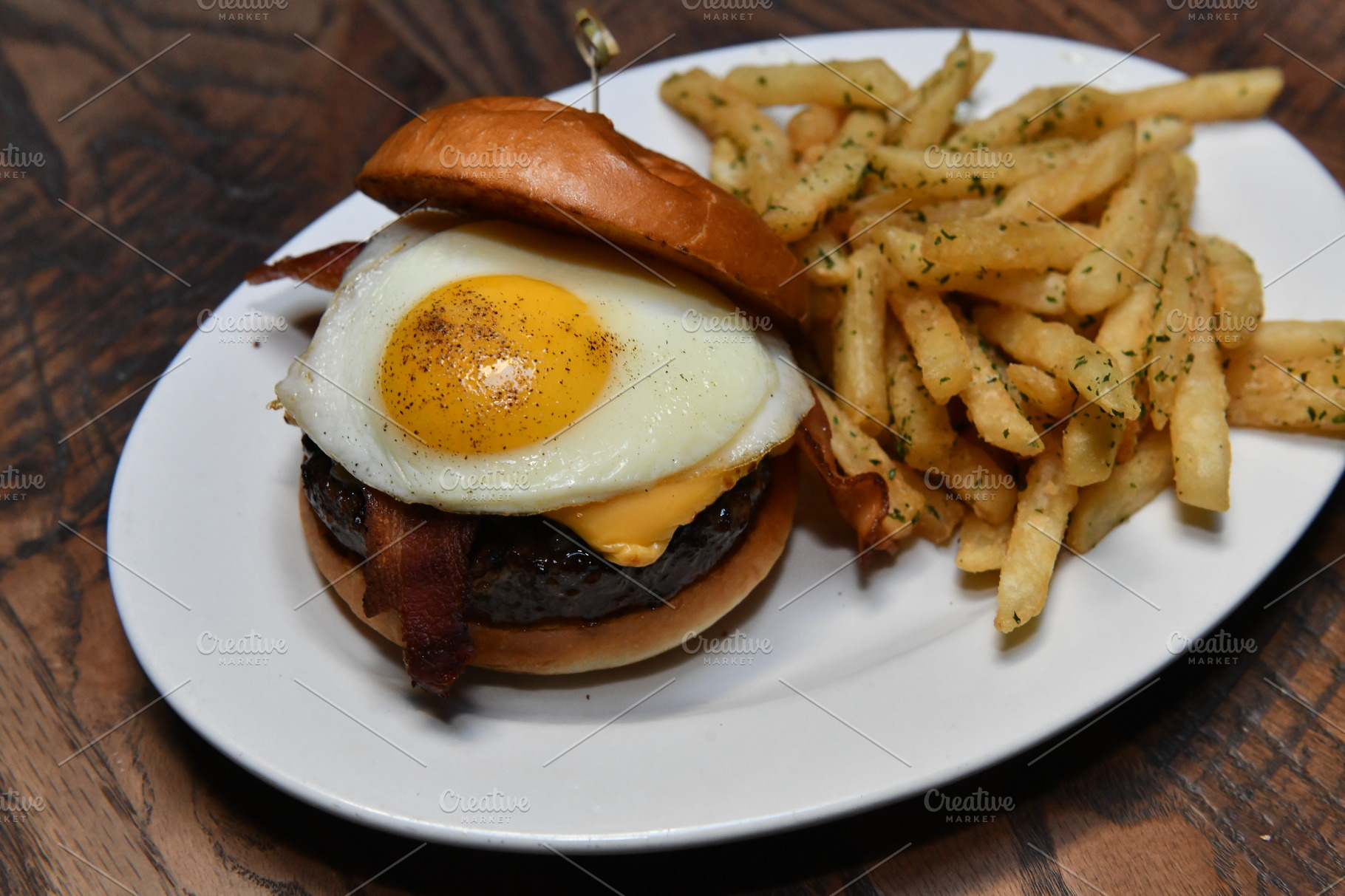 bacon-burger-with-egg-and-fries-containing-diner-local-and-rustic