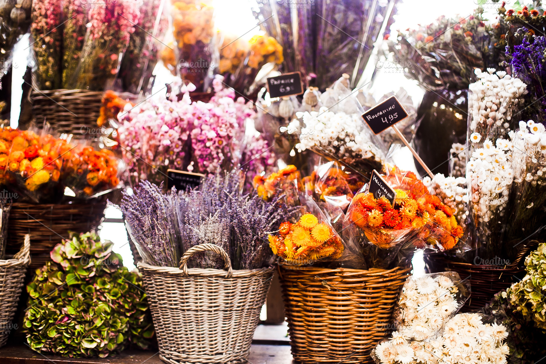 Flowers in the market background featuring market, flower, and bouquet | Nature Stock Photos