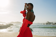 Beautiful african woman in red dress | People Images ~ Creative Market