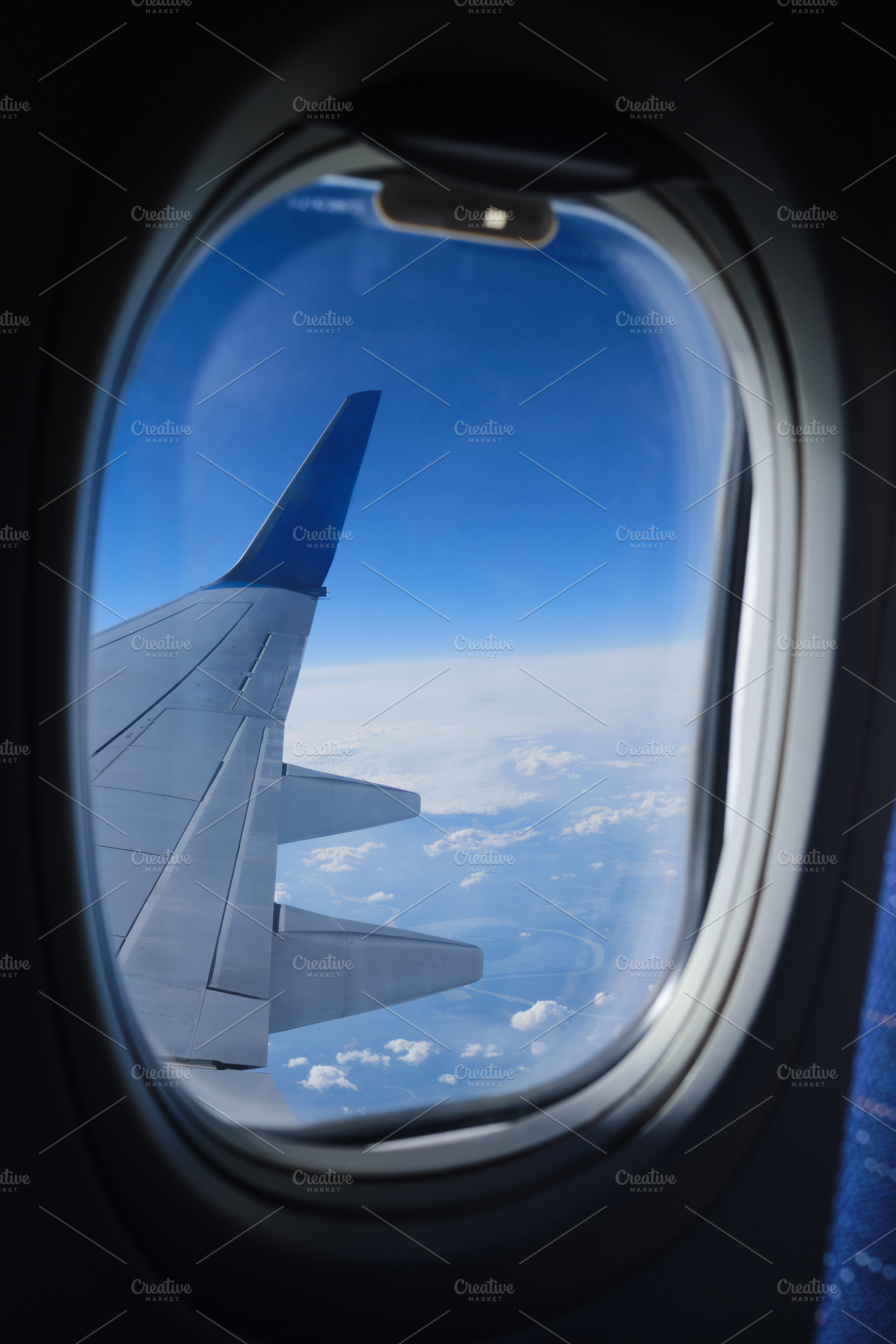 Download Airplane Window View On The Clouds A High Quality Stock Photos Creative Market