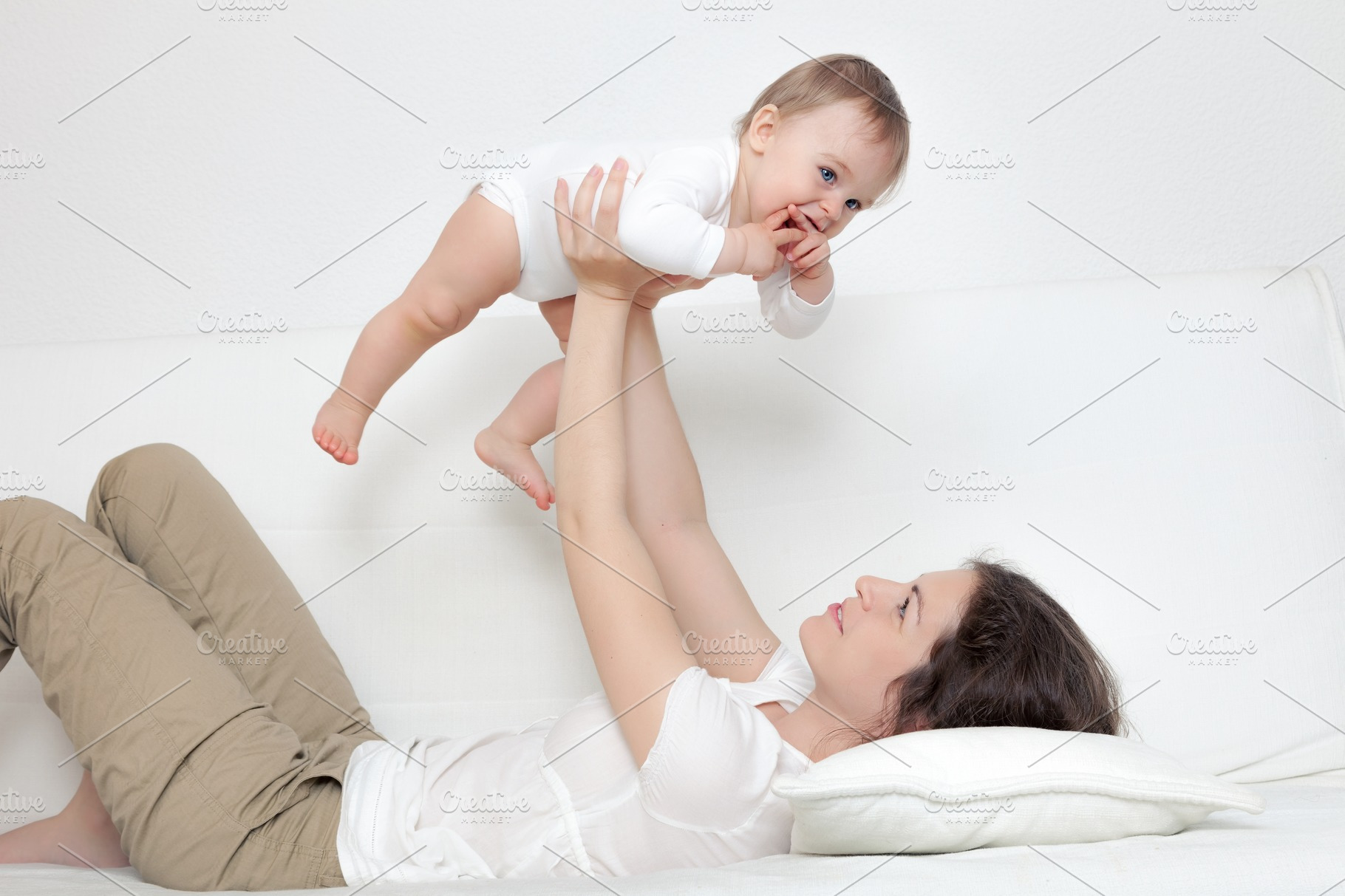 Mother playing with baby containing baby, mother, and kid | People ...