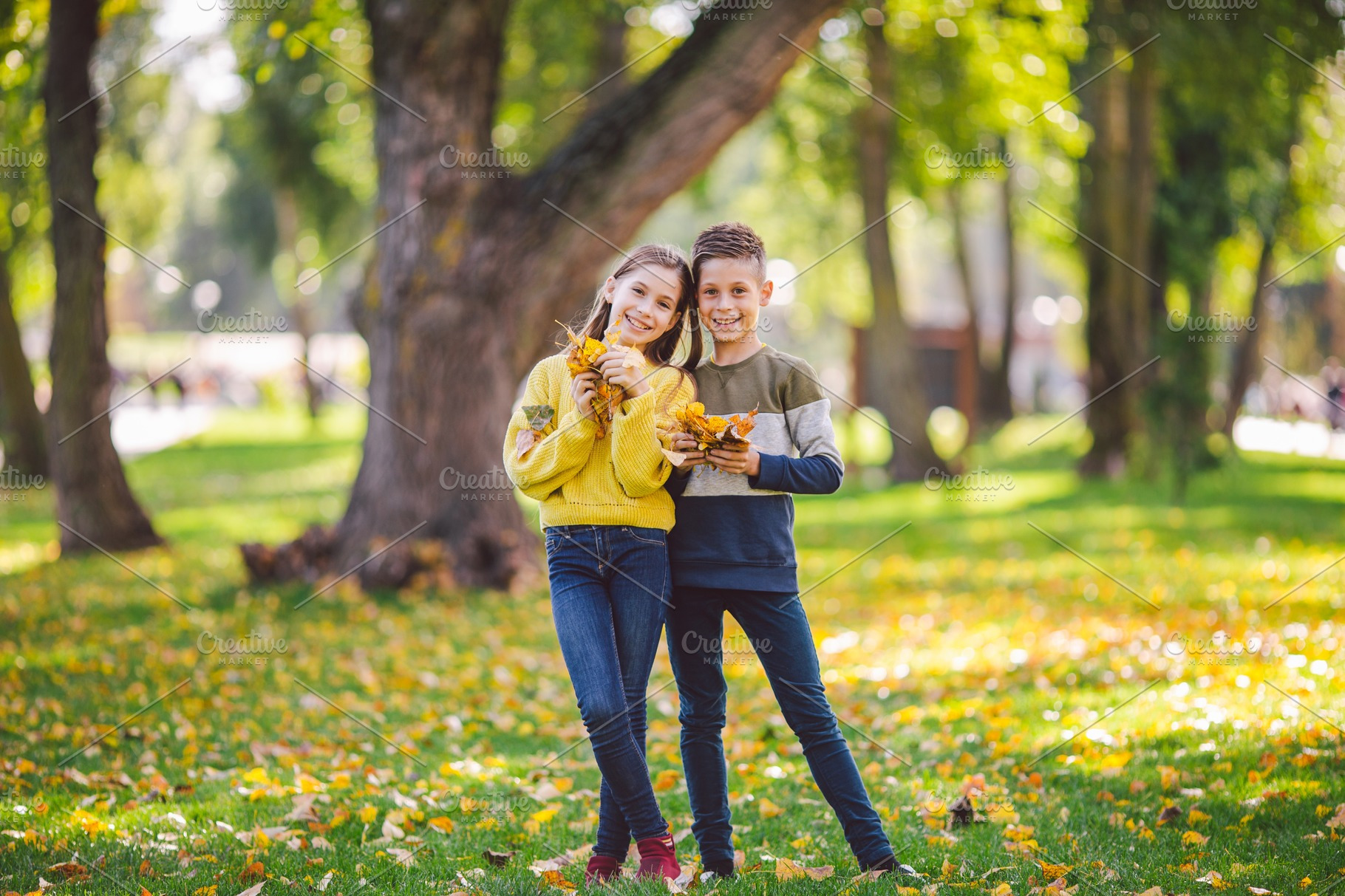 Happy Twins Teenagers Boy And Girl Containing Autumn Fall And Leaves High Quality Nature Stock Photos Creative Market