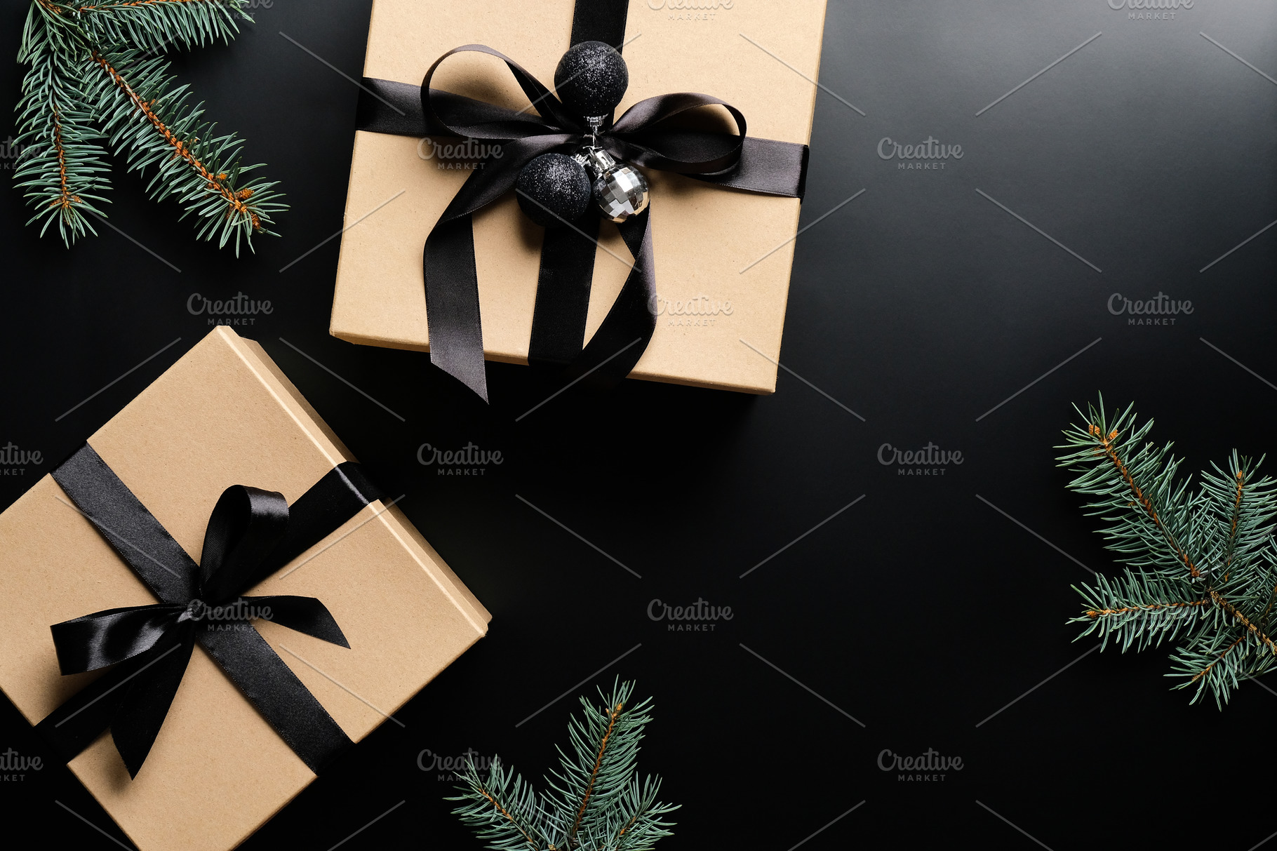 Christmas present with blue bow and silver decorations closeup Stock Photo  by katrinshine